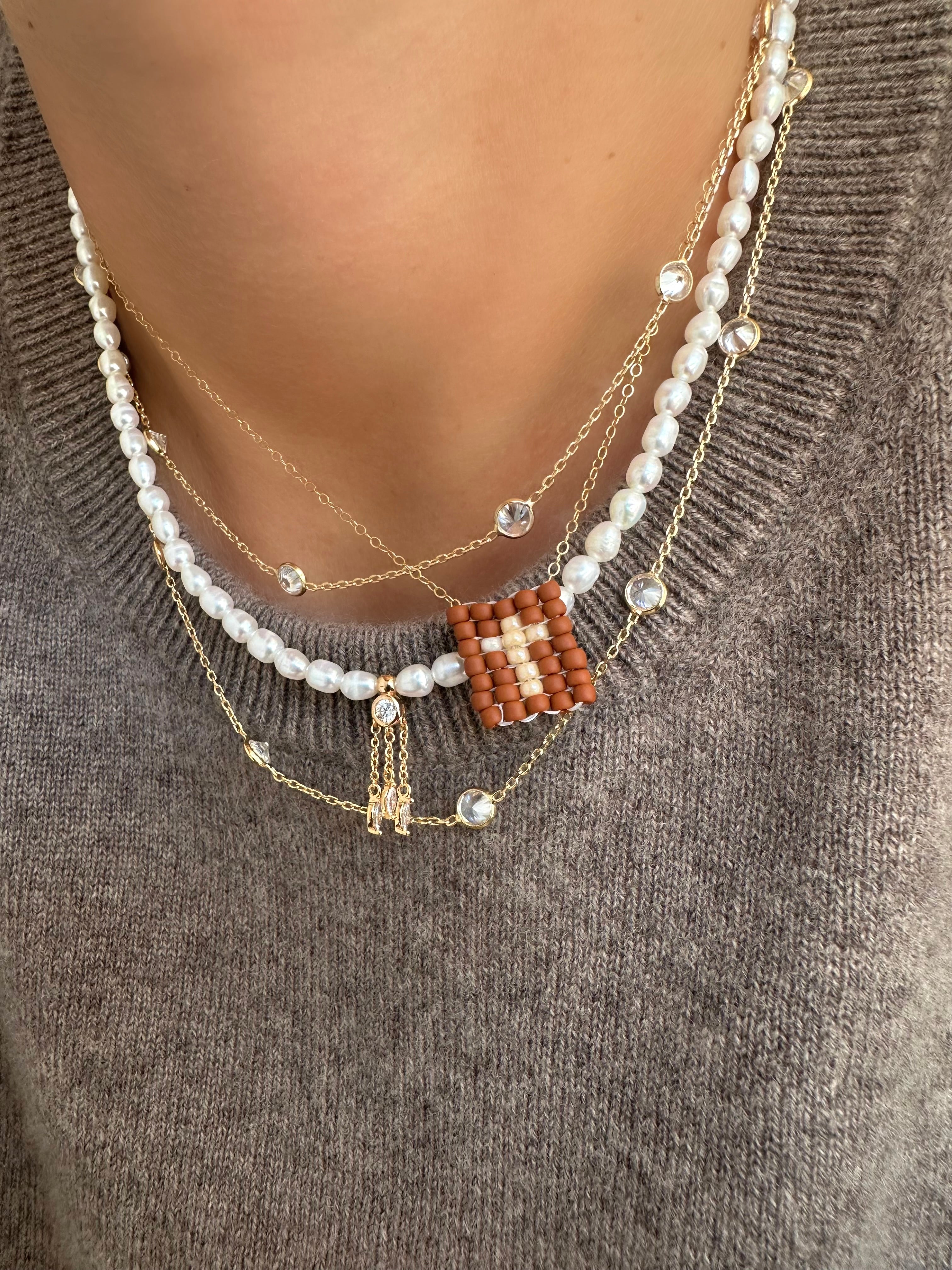 Collar Greta Cruz (Marrón) (Laminado en Oro)